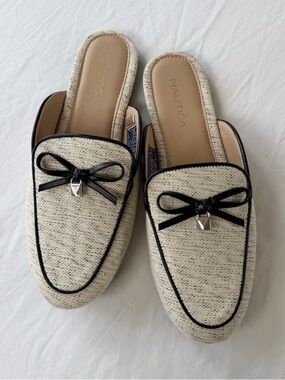 Nautica Cream Slip-On Mules with Black Trim and Bow Accent